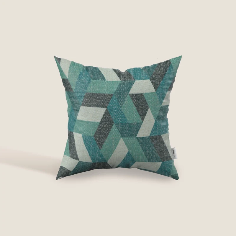 Unreal cuscini a fantasia geometriche in tessuto idrorepellente disponibile in diverse colorazioni verde acqua